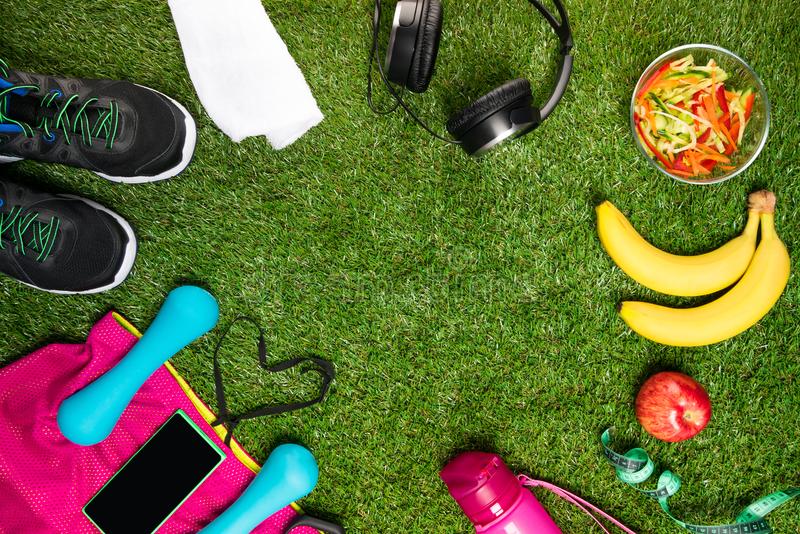 Sports Nutrition Set And Things On A Background Of Green ...
